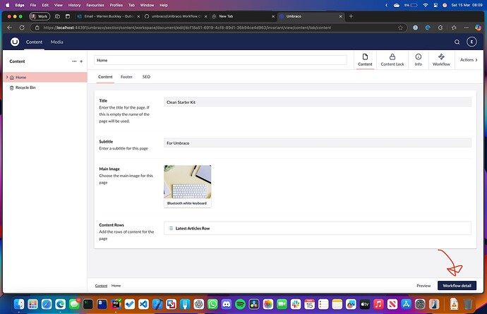 A web browser displays the Umbraco content management system, showing the "Home" content section with fields for title, subtitle, and a main image selection, along with a "Workflow detail" button at the bottom-right, indicated by a red arrow. (Captioned by AI)
